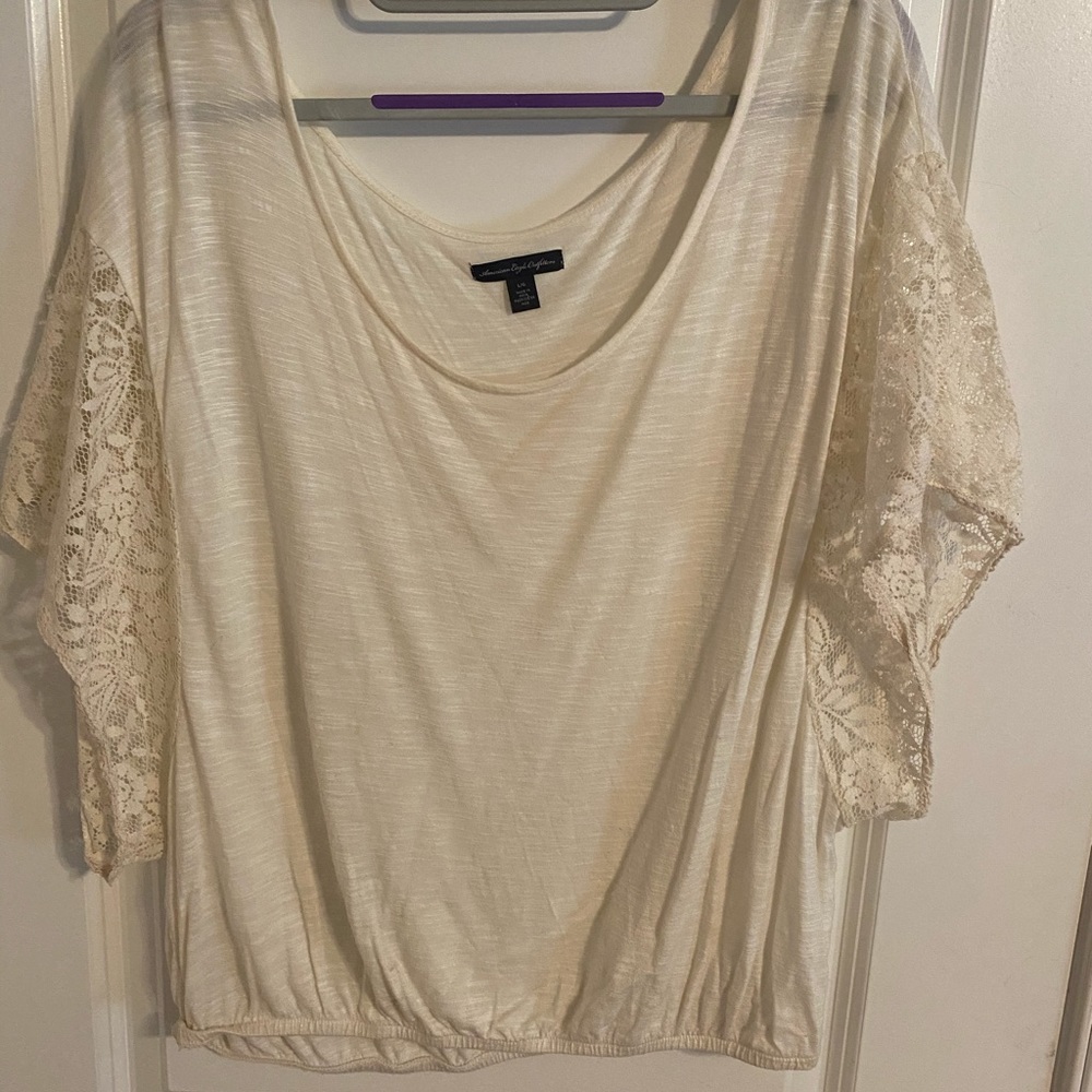 White/cream colored cropped top